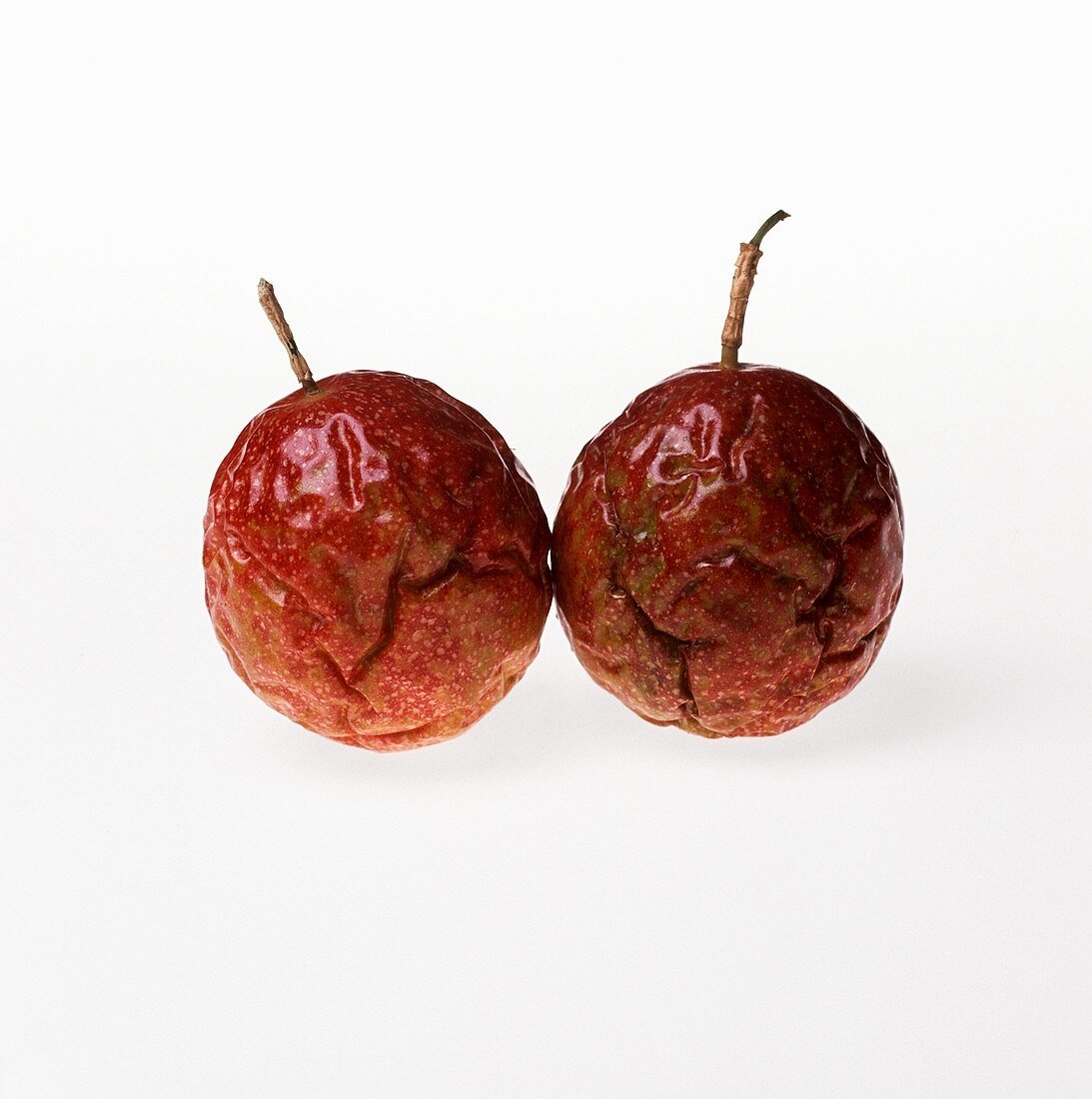 Two Passion Fruit on White Background