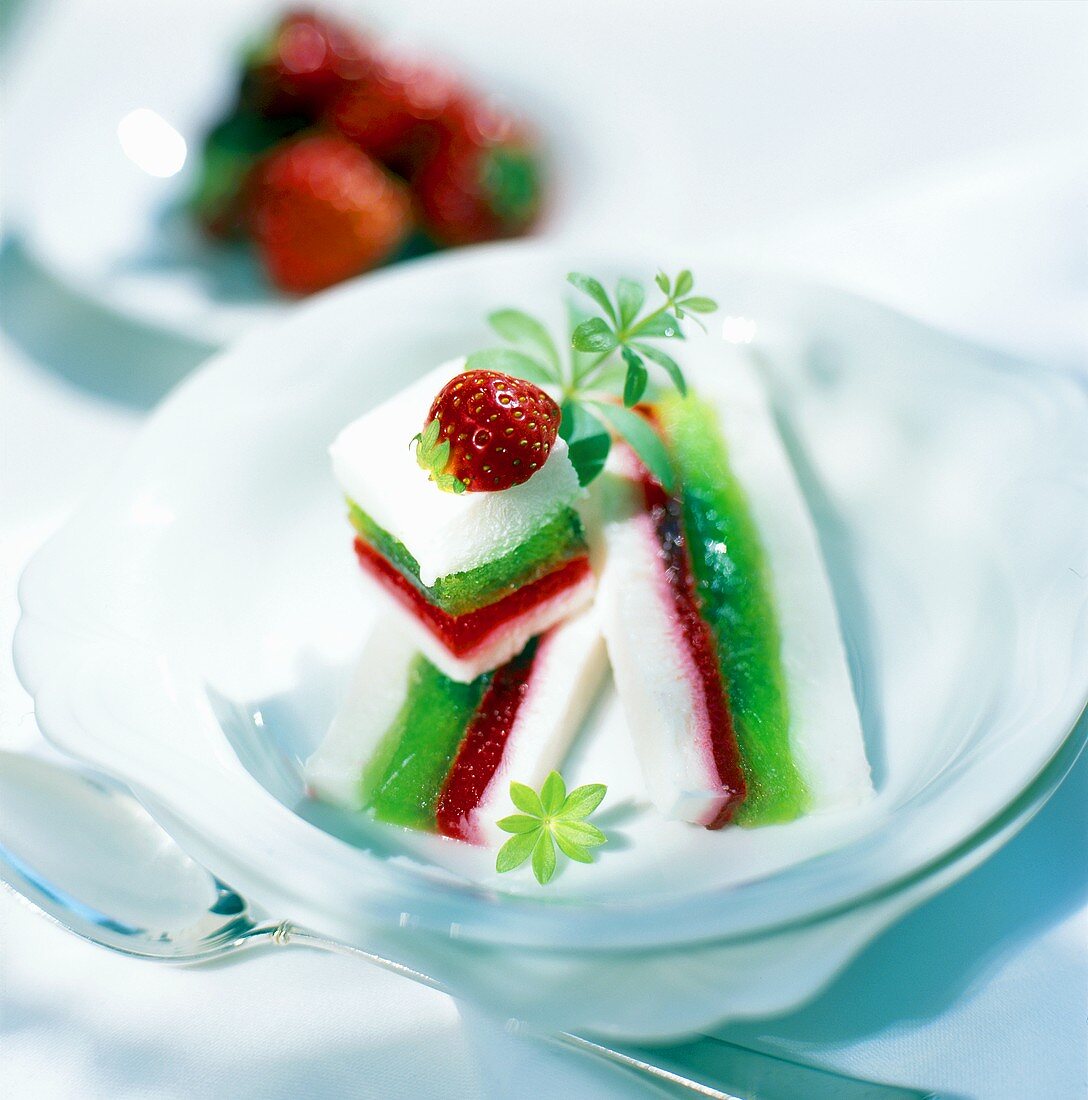 Colourful layered jelly with woodruff