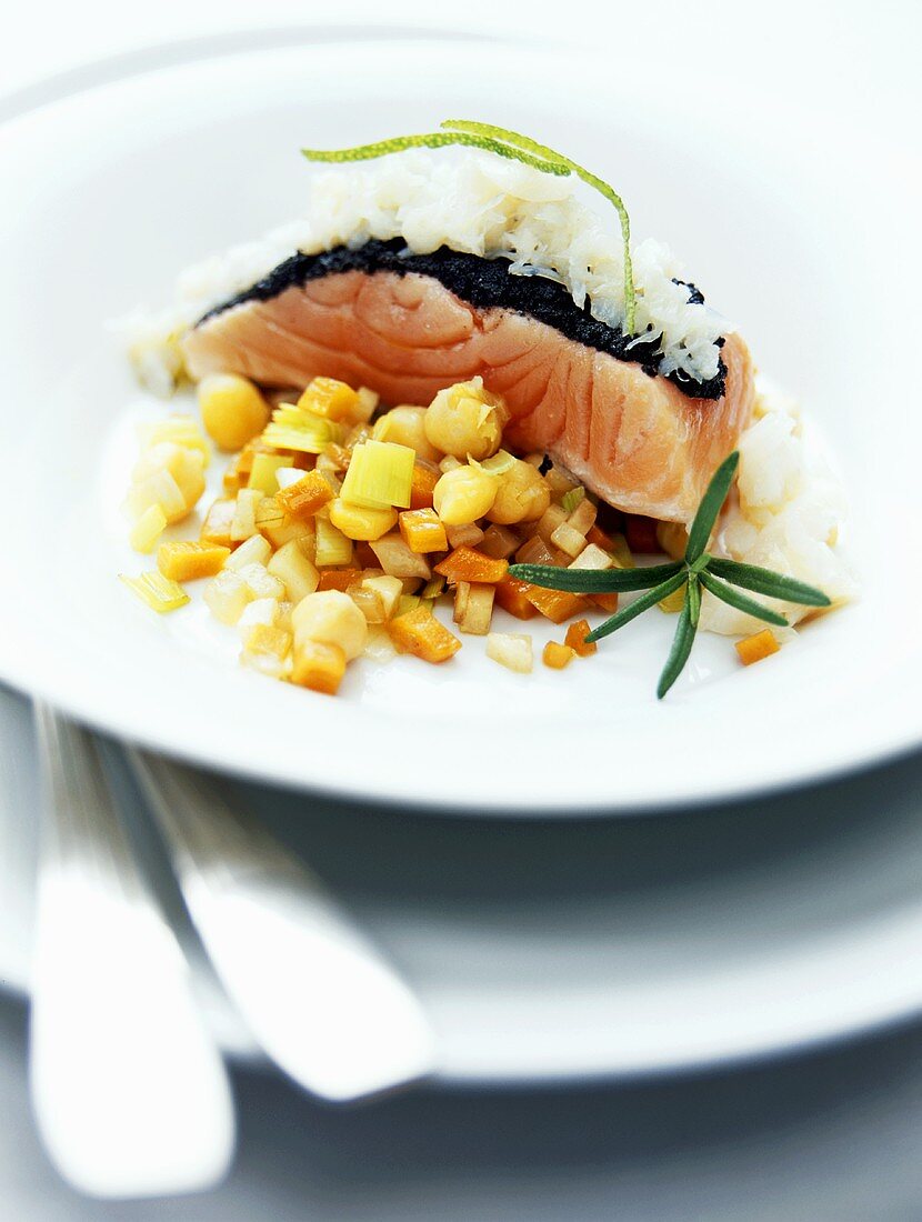 Salmon with tapenade and cod tartare on a chickpea salad