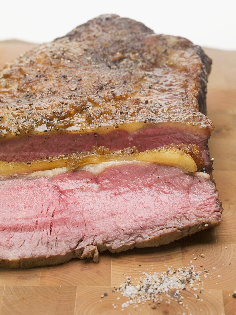 Roast beef on a wooden board