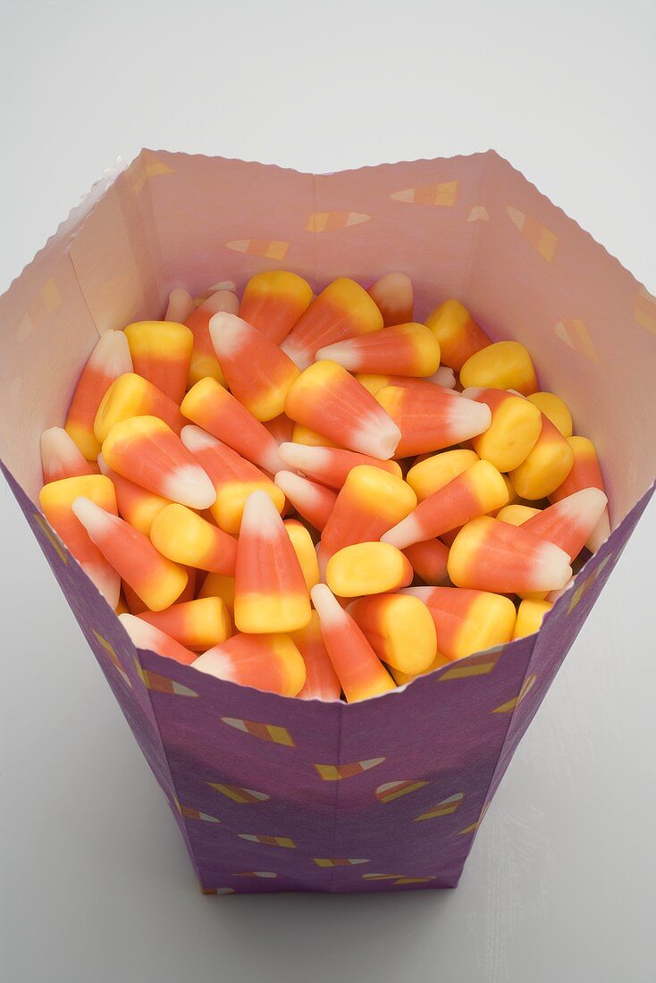 Candy corn in paper bag