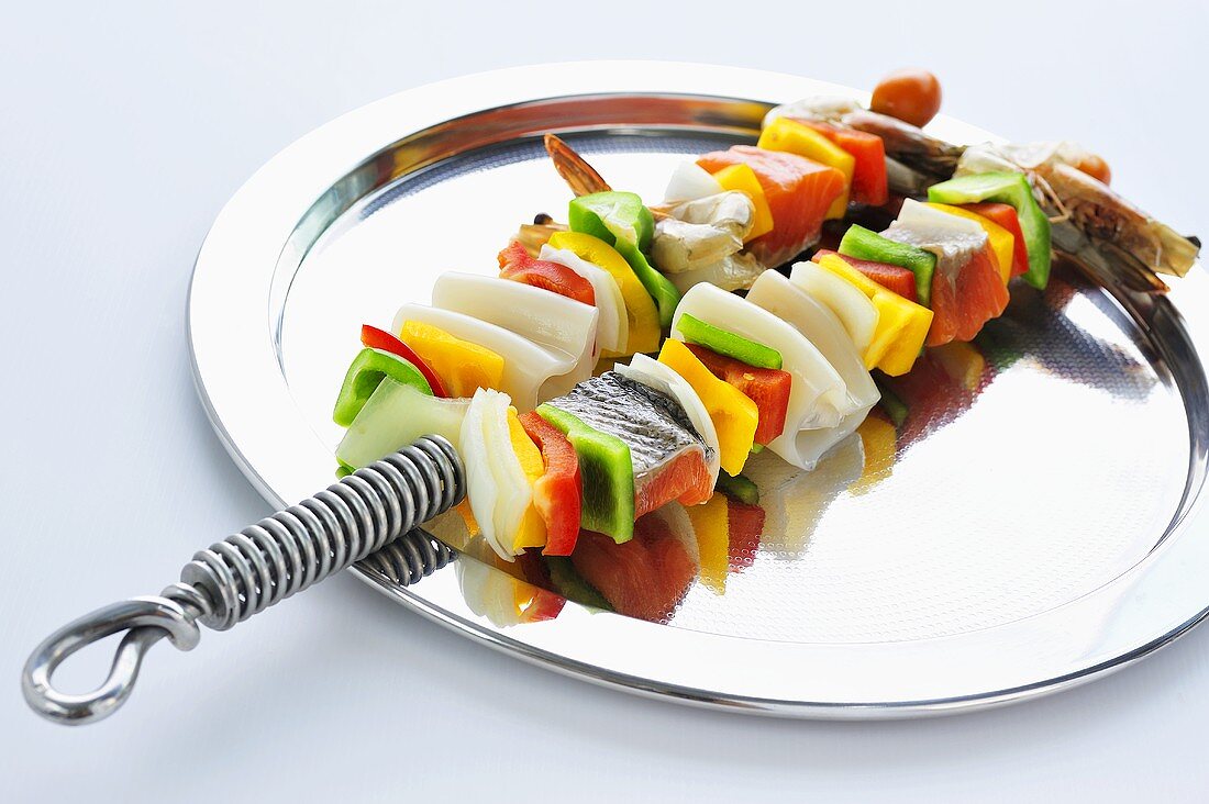 Raw seafood and vegetable kebabs