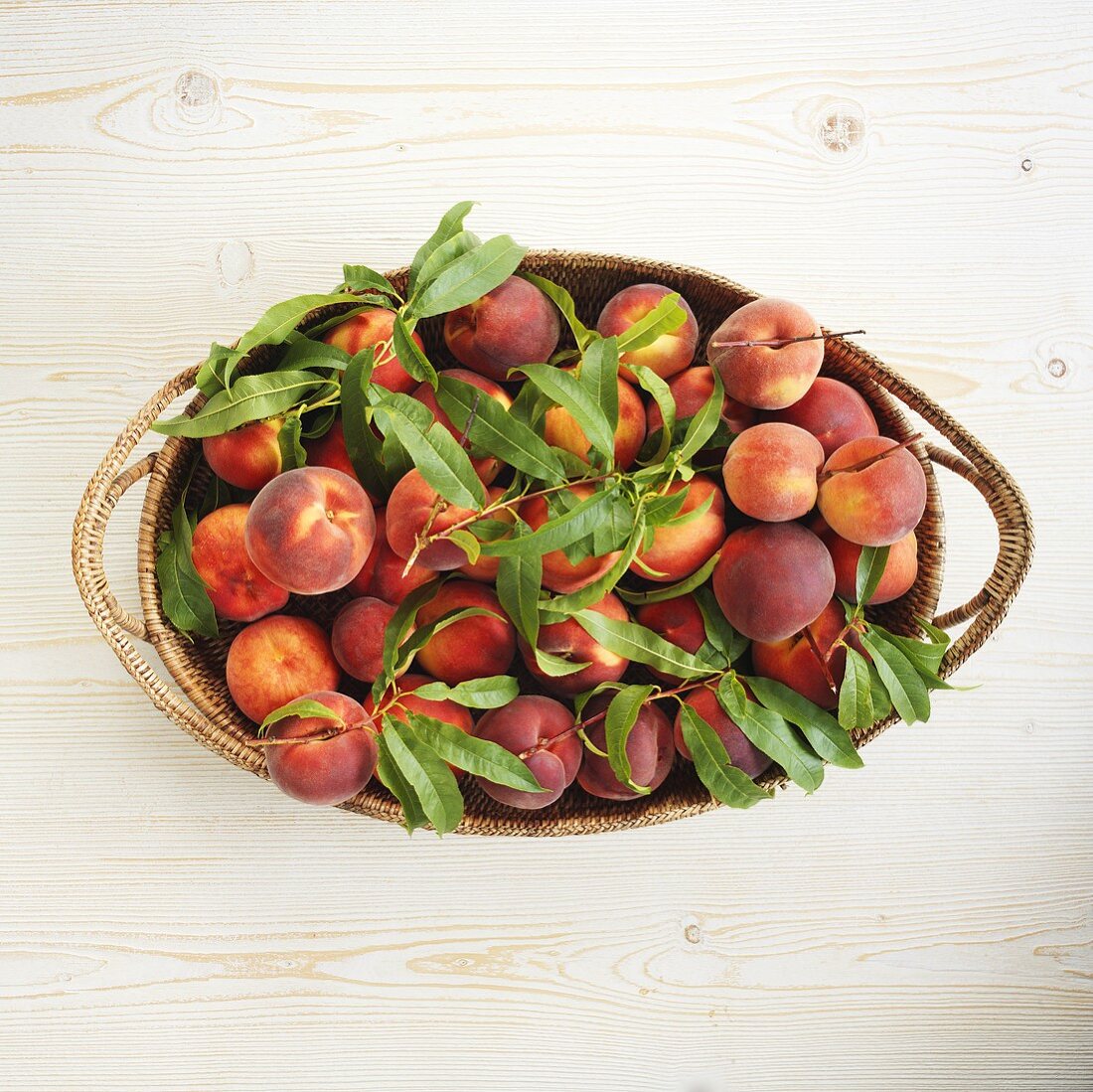 Organic peaches in a basket