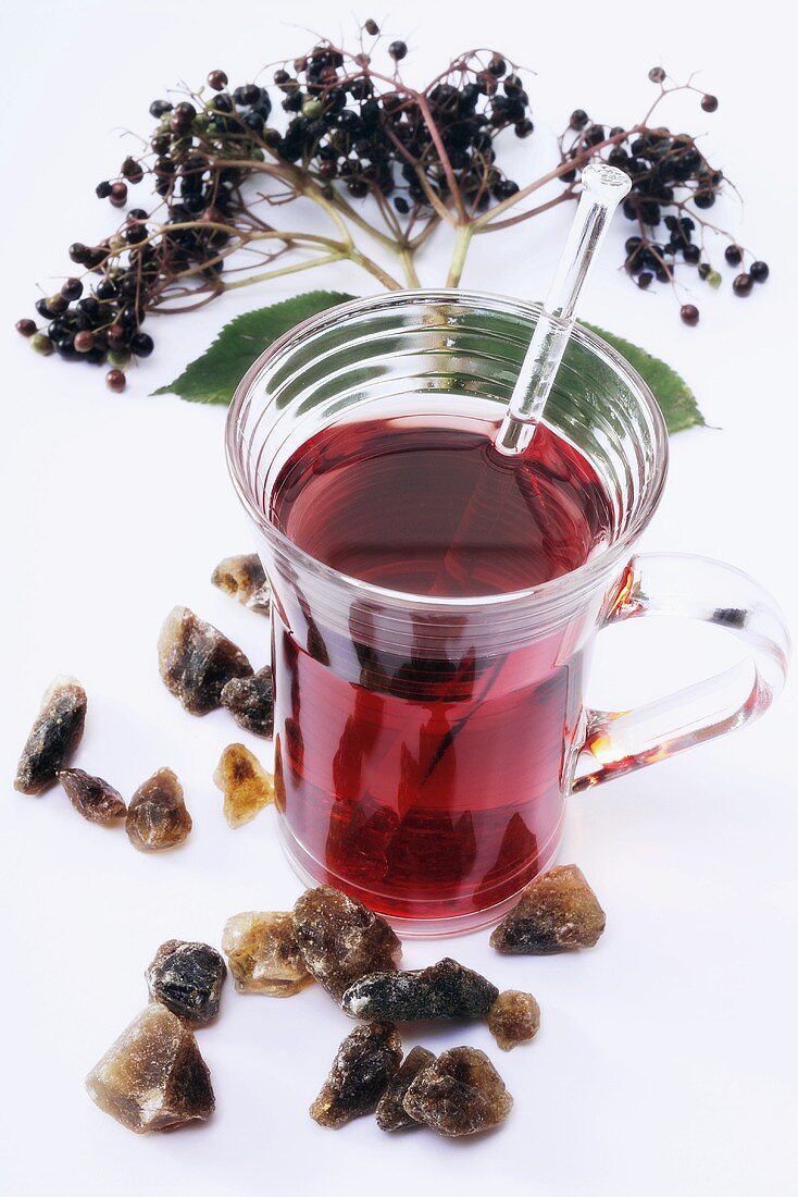 Elderberry tea, elderberries and sugar crystals
