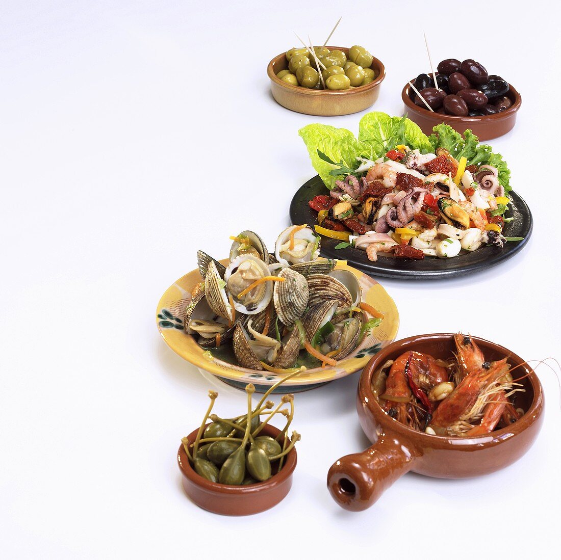 Assorted tapas (capers, seafood and olives)