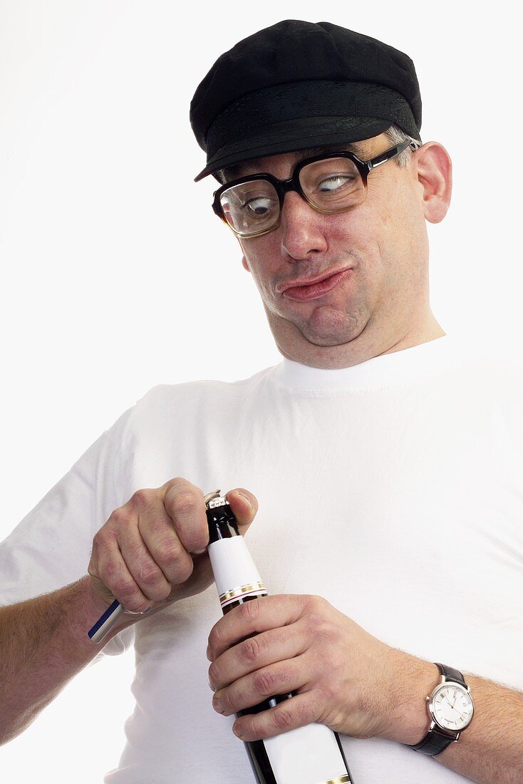 Man holding beer bottle