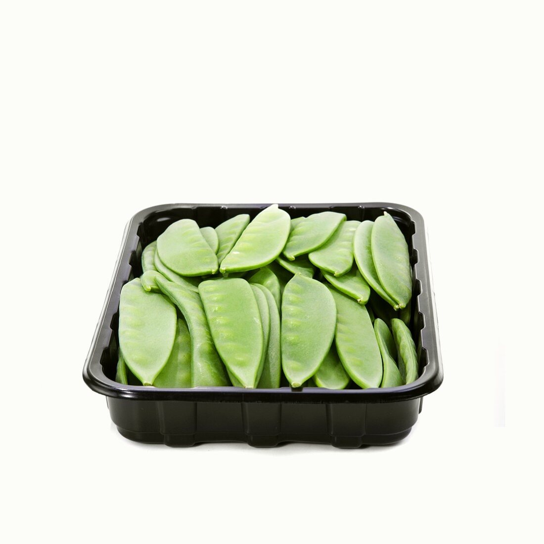 Mangetout in a plastic tray