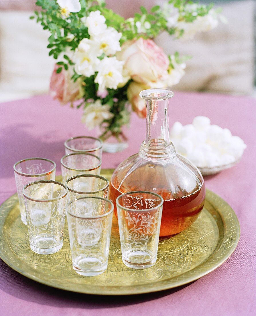 Glasses and carafe on a tray