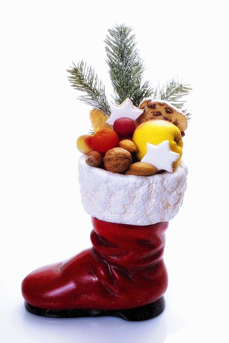 Santa Claus boot full of fruits, close-up