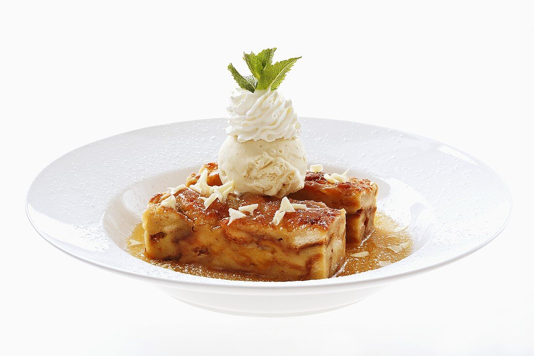 Bread pudding with white chocolate and vanilla ice cream