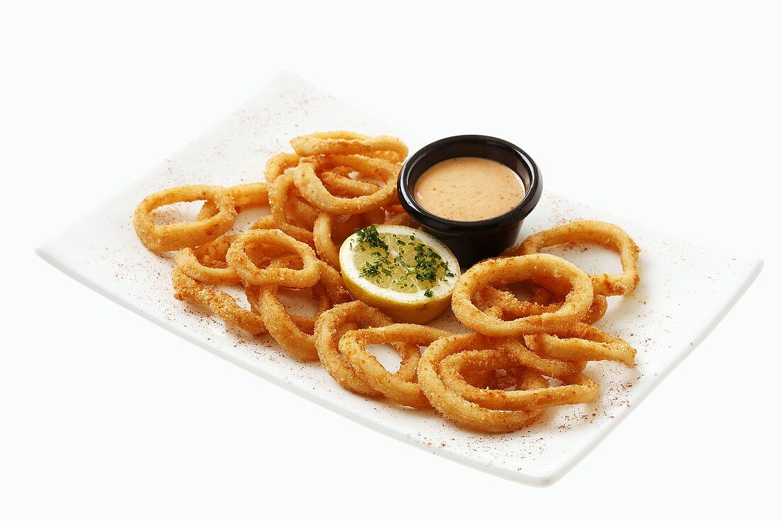 Deep-fried calamari with cocktail sauce