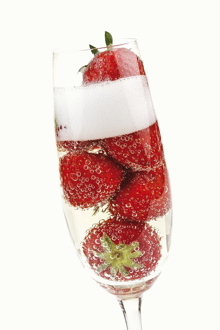 Sparkling wine with fresh strawberries