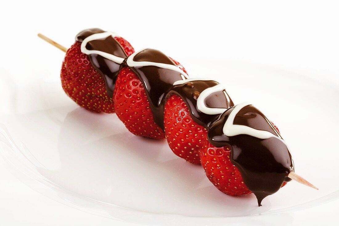 Strawberry skewer with chocolate icing