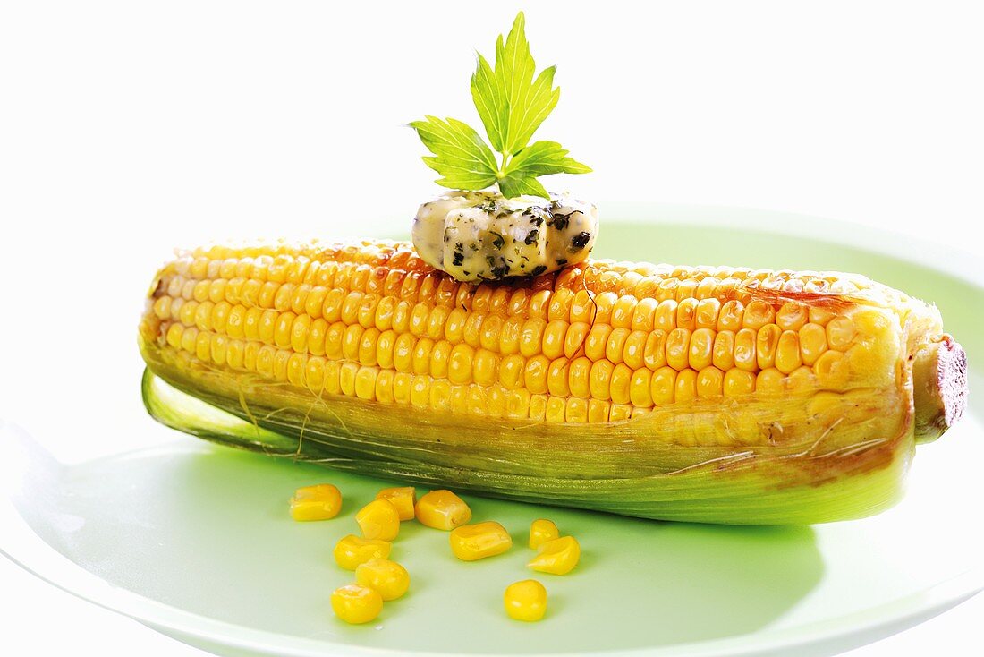 Grilled corn on the cob with herb butter