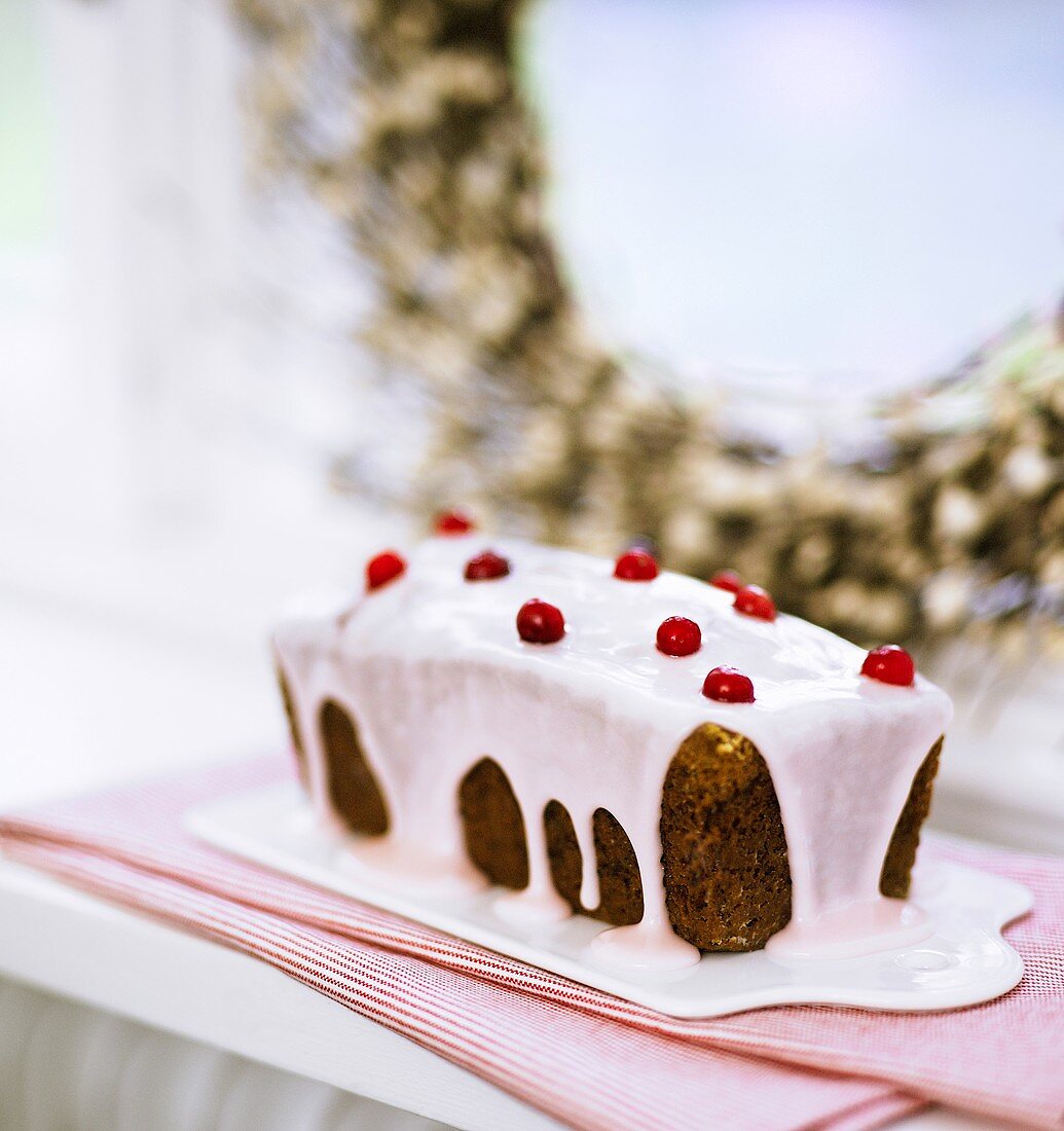 Iced loaf cake with cranberries