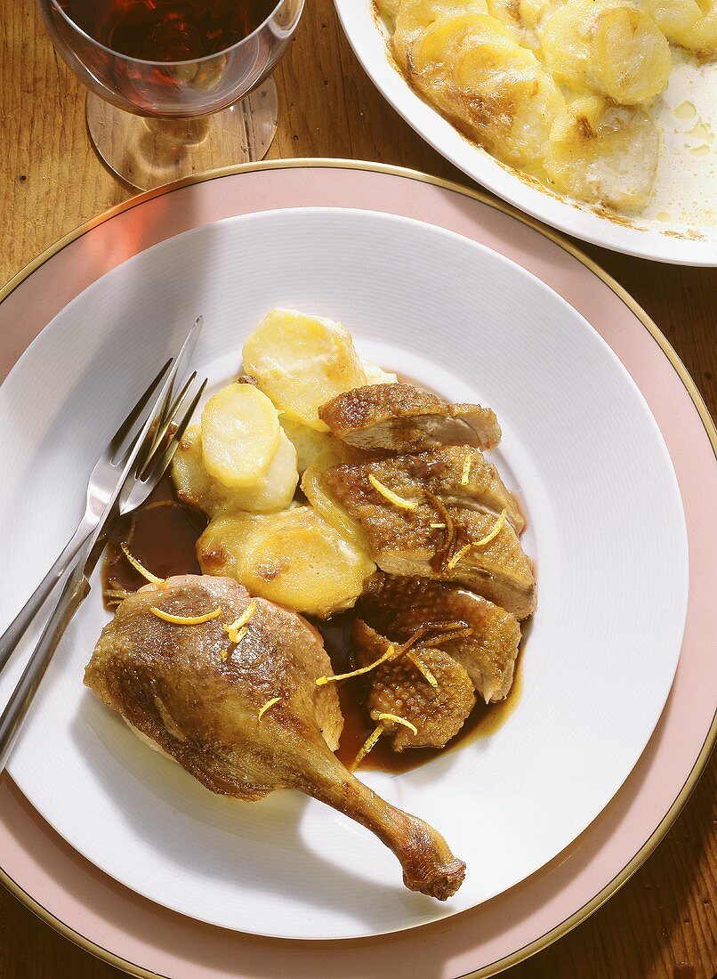 Duck with Orange Sauce & Potatoes au gratin