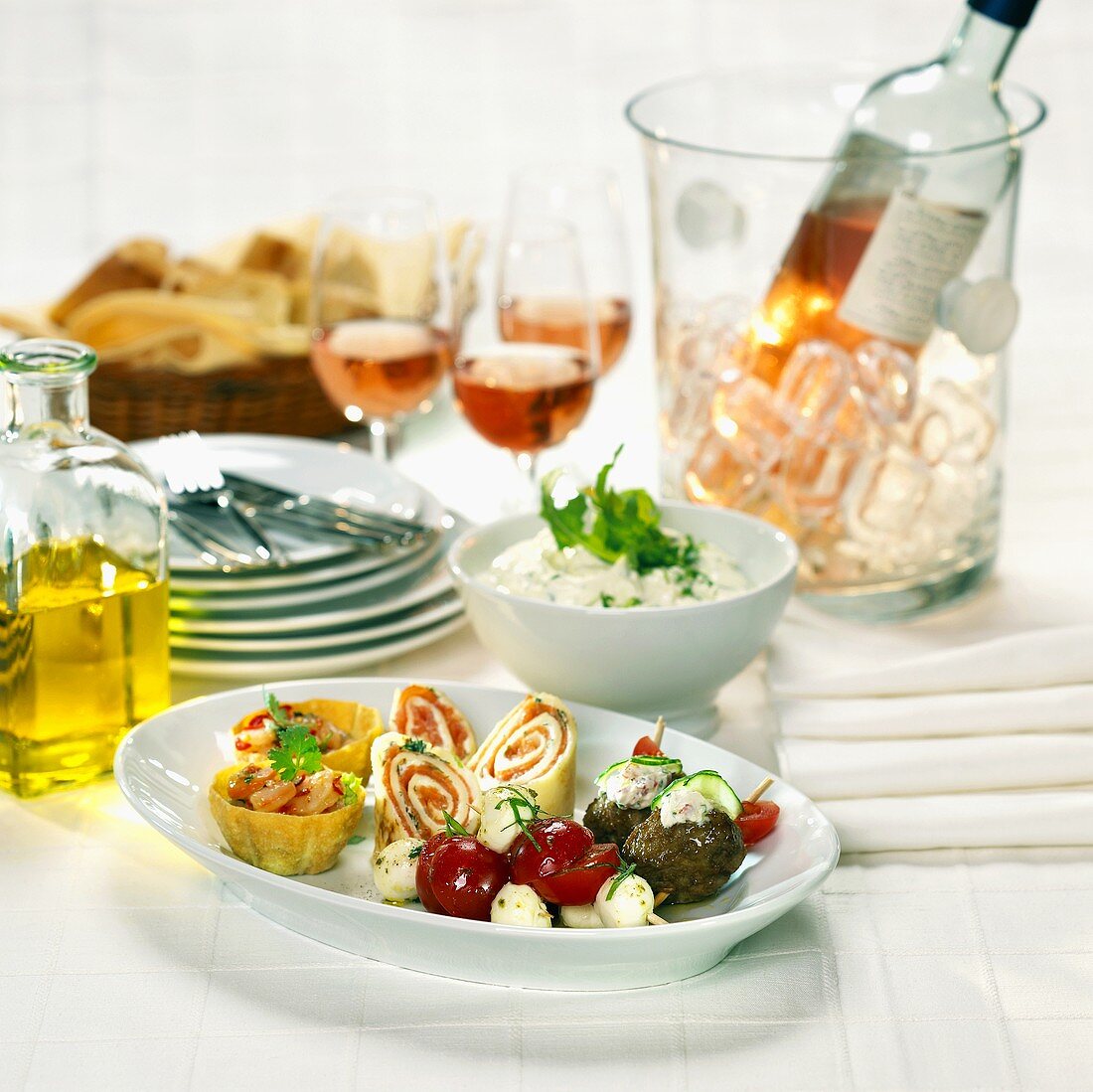 Antipasto romano (Assorted appetisers with rosé wine, Italy)