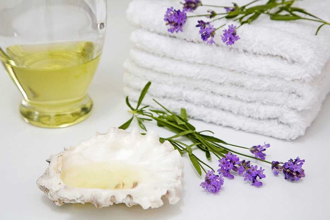 Towels, lavender, shell and lavender oil