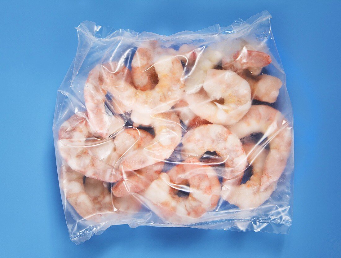 Frozen shrimps in plastic bag, elevated view