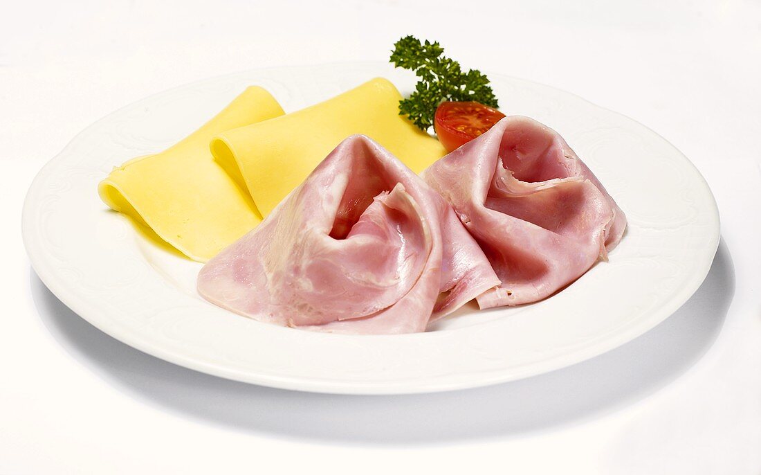 Boiled ham and cheese on plate