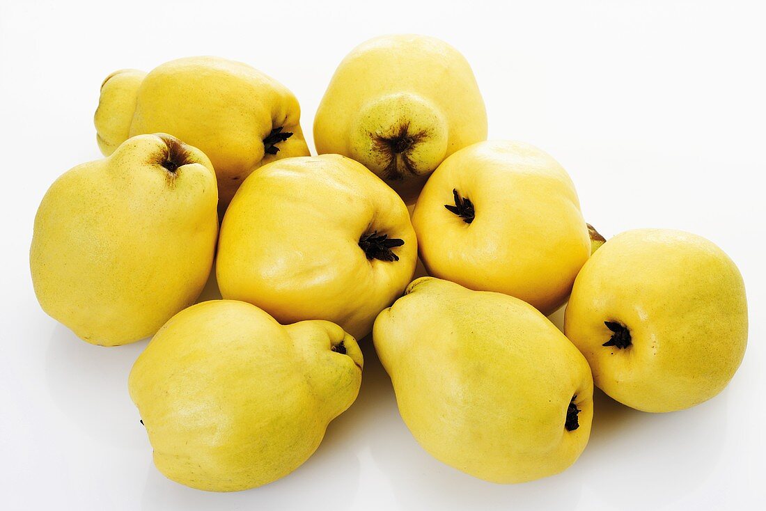Quinces on white background