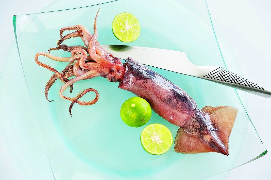 Red squid with lime slices