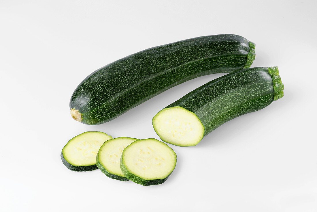 Courgettes, whole and partly sliced