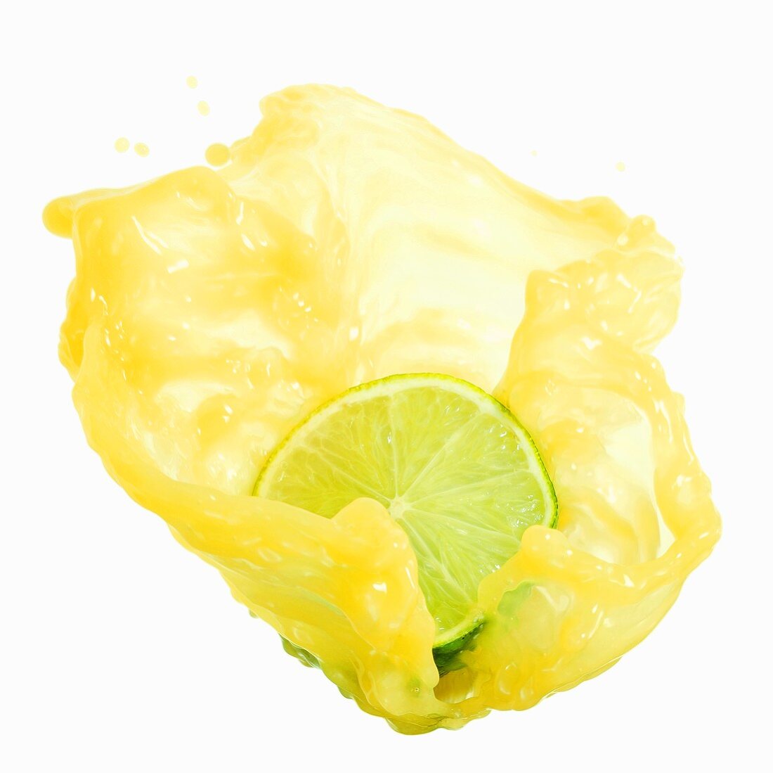 Half a lime with splashing lime juice