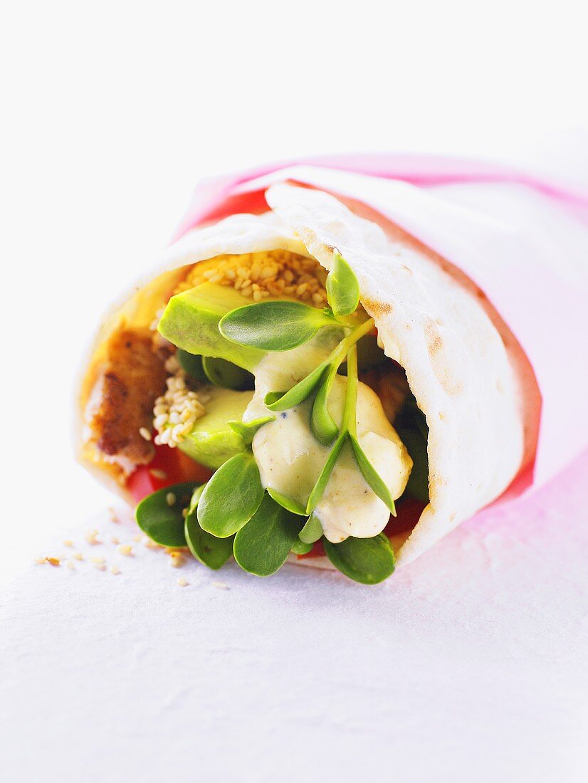 Avocado wrap with sesame seeds