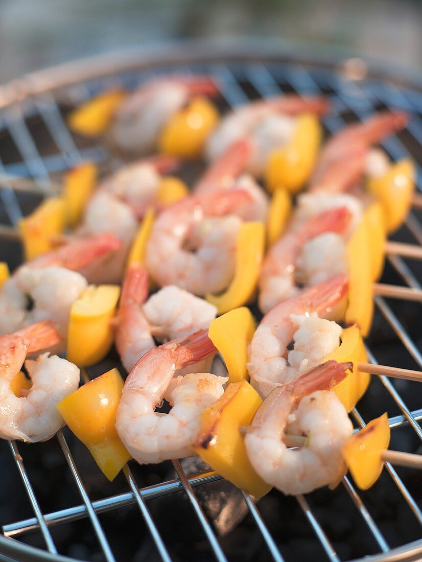 Prawn and pepper skewers on a barbecue