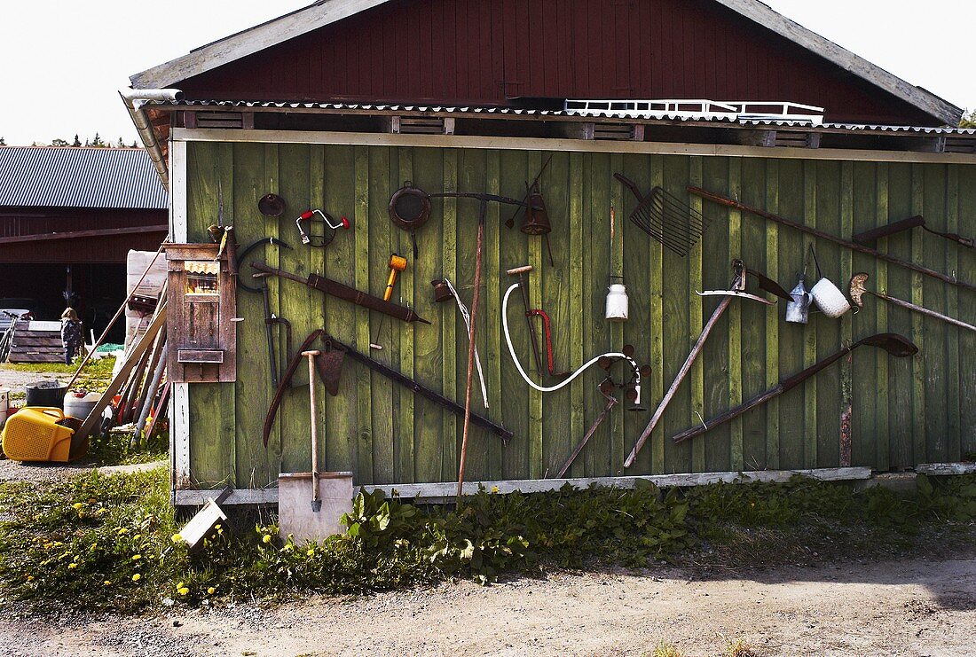 Implements on a shed wall