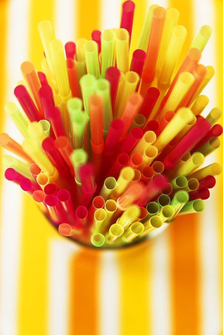 Many Colorful Straws in a Cup; Close Up of Tips