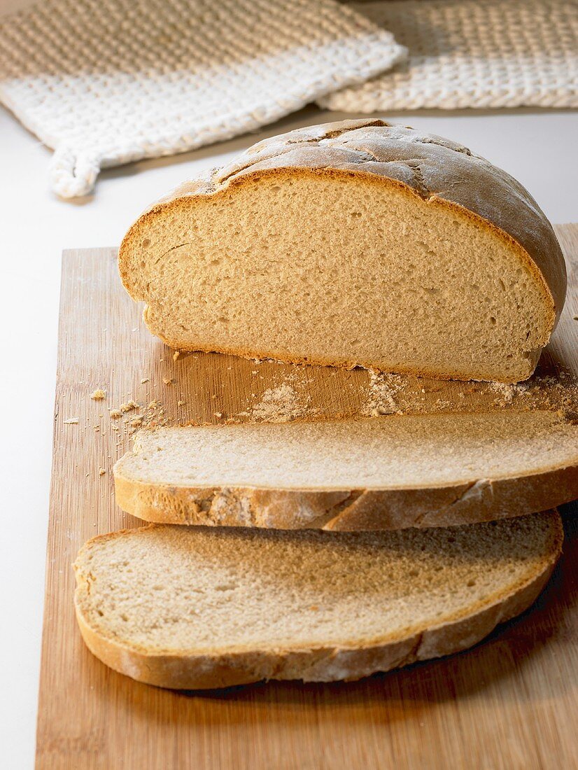 Organic wheat bread, partly sliced