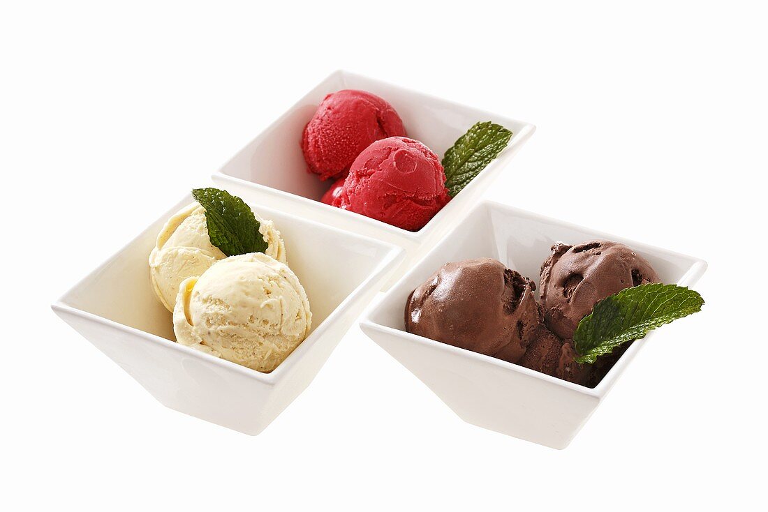 Various flavours of ice cream (chocolate, cherry, vanilla)