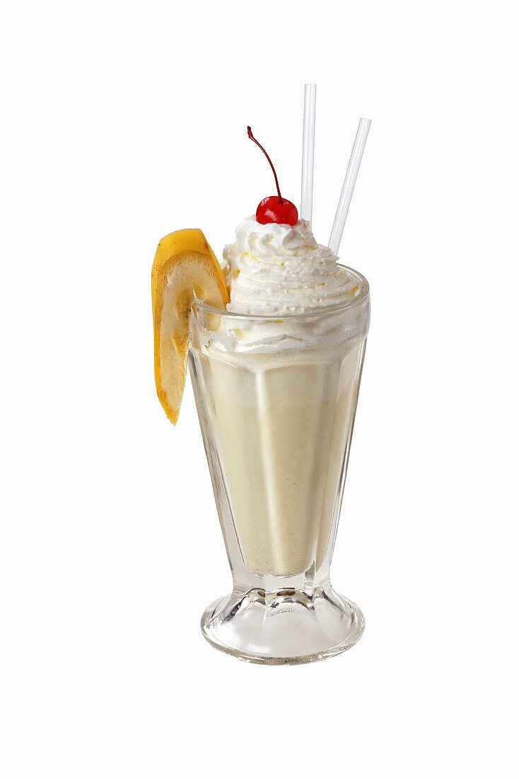 Banana shake with cream and cherry