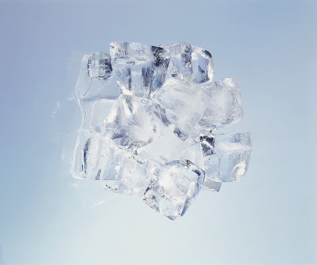 Lots of ice cubes; blue background