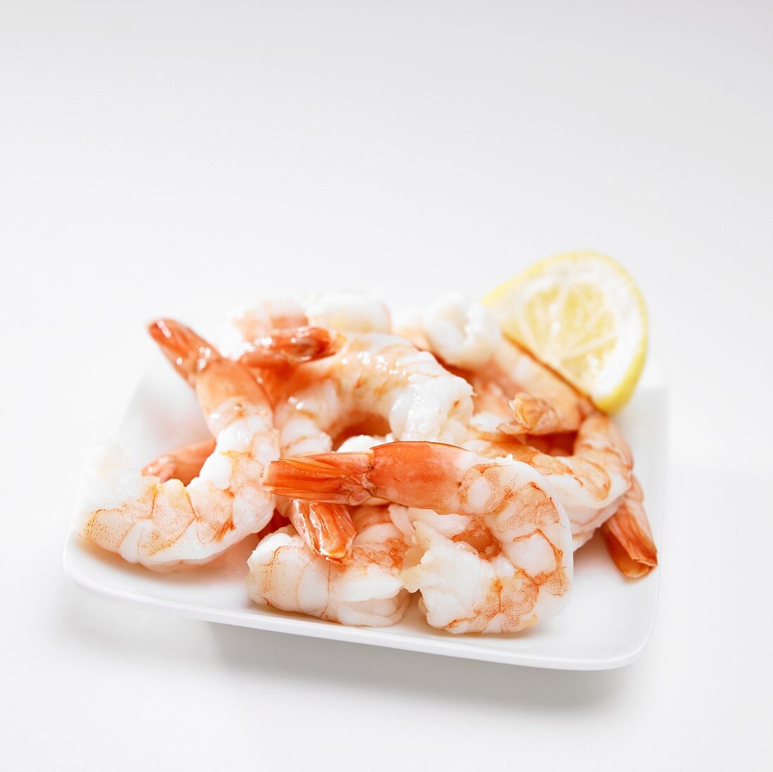 Plate of Cooked Shrimp with Lemon