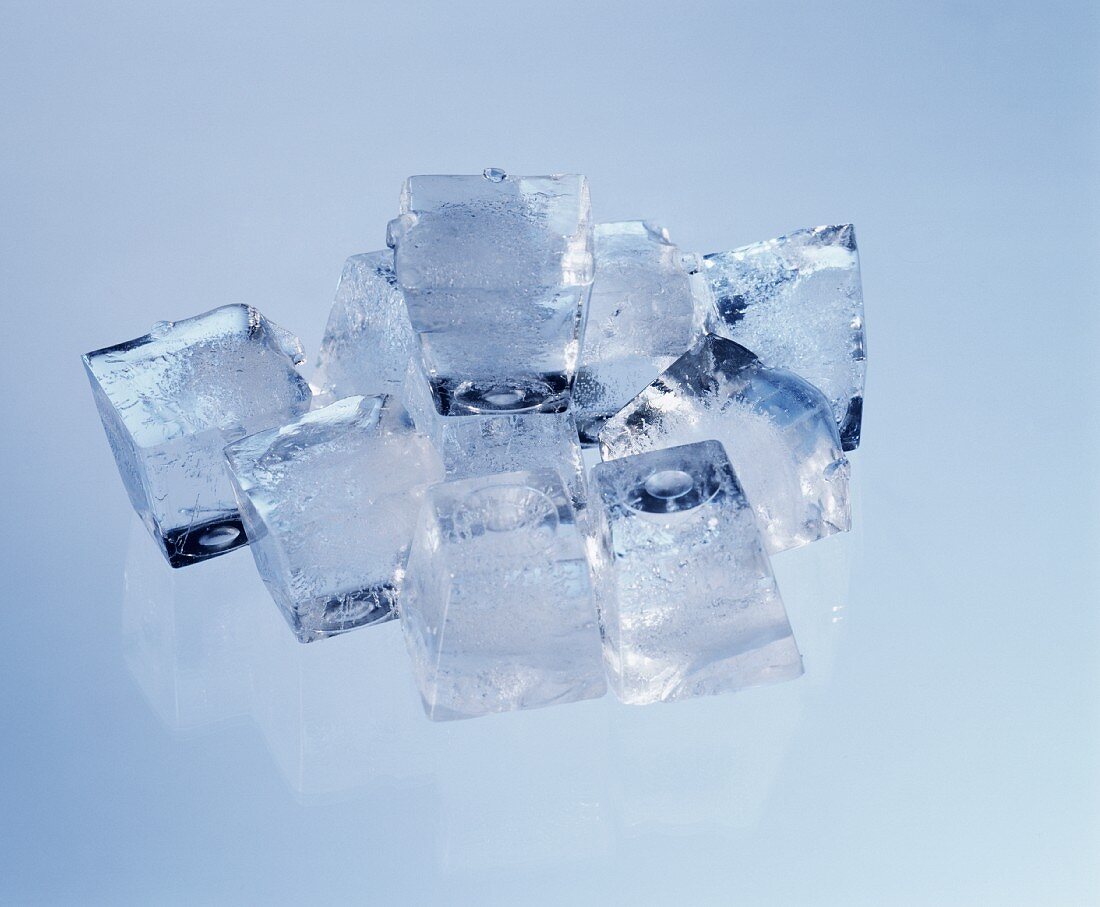 A few ice cubes; blue background