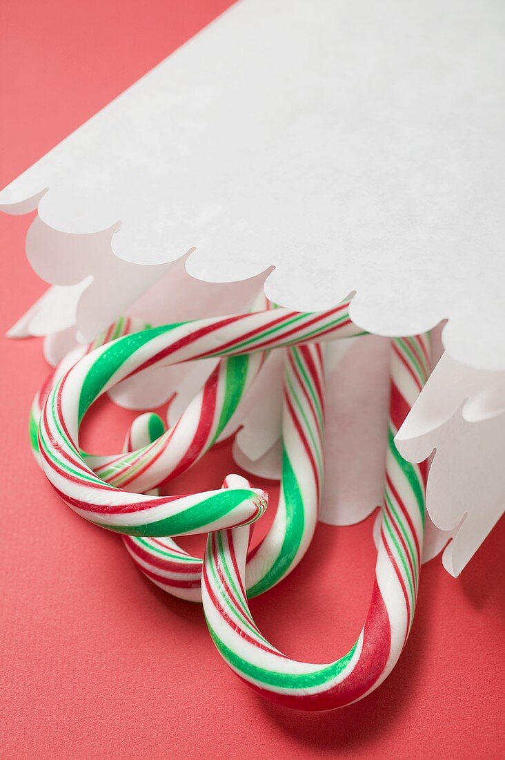 Candy canes in paper bag