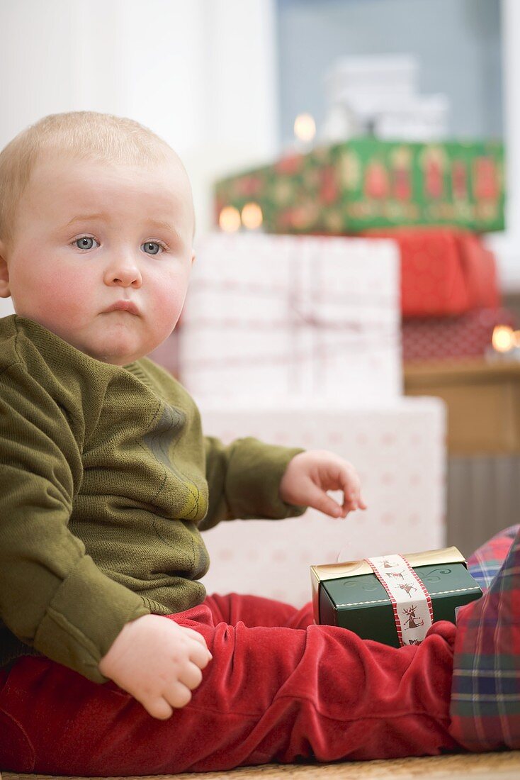 Baby with Christmas gifts