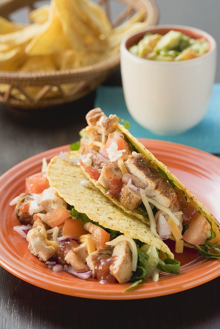 Chicken tacos, dip and nachos (Mexico)