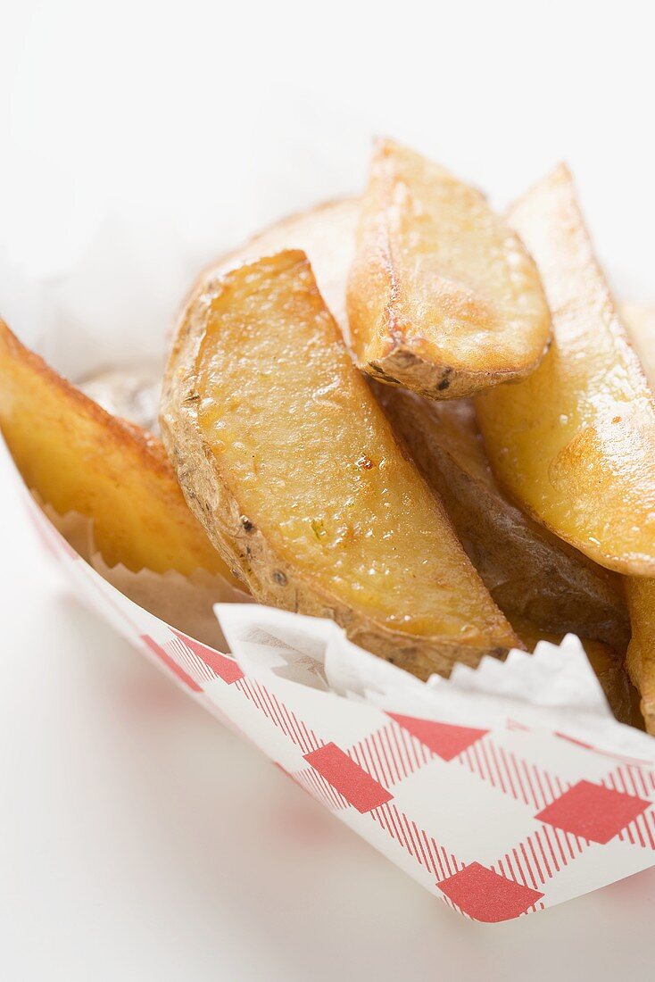 Potato wedges in cardboard container