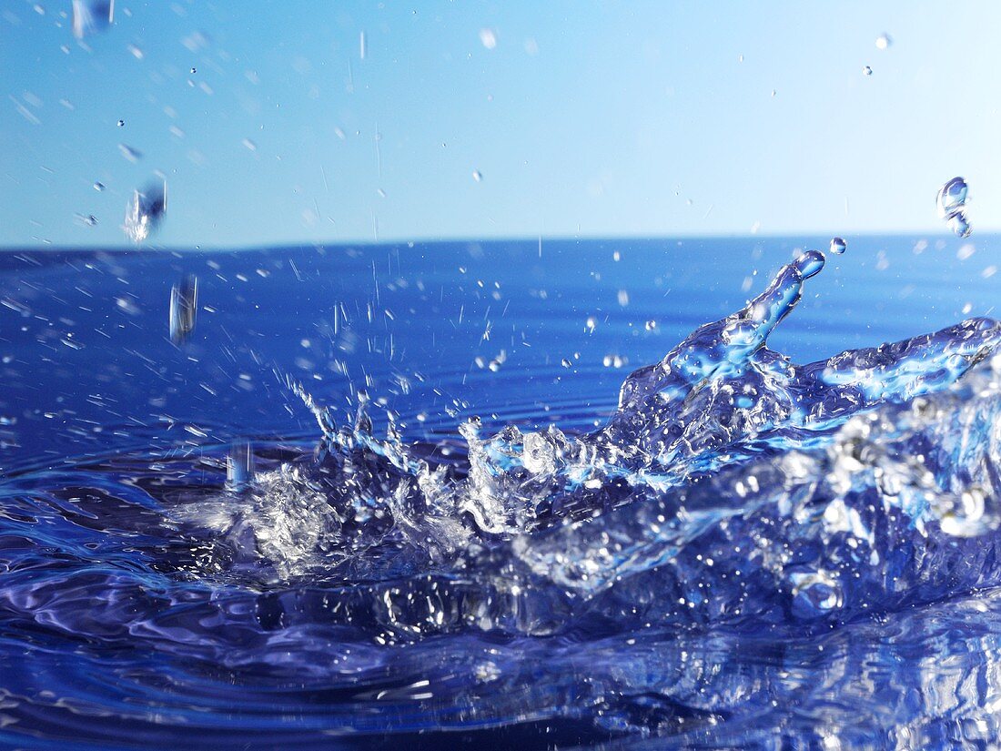 Splashing blue water