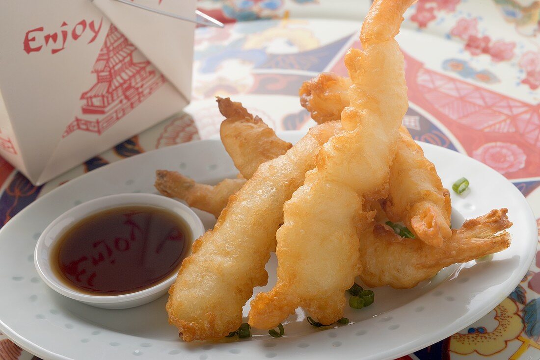 Deep-fried prawns in batter with soy sauce to take away (Asia)