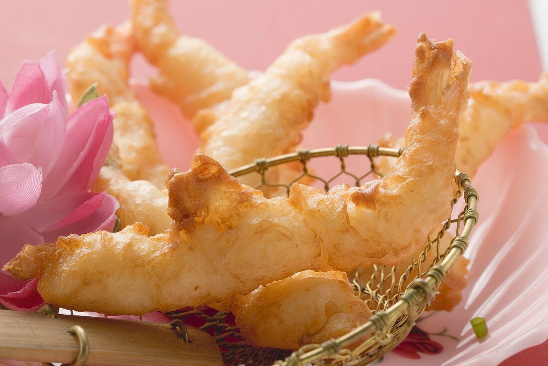 Deep-fried prawns in batter in straining spoon (Asia)