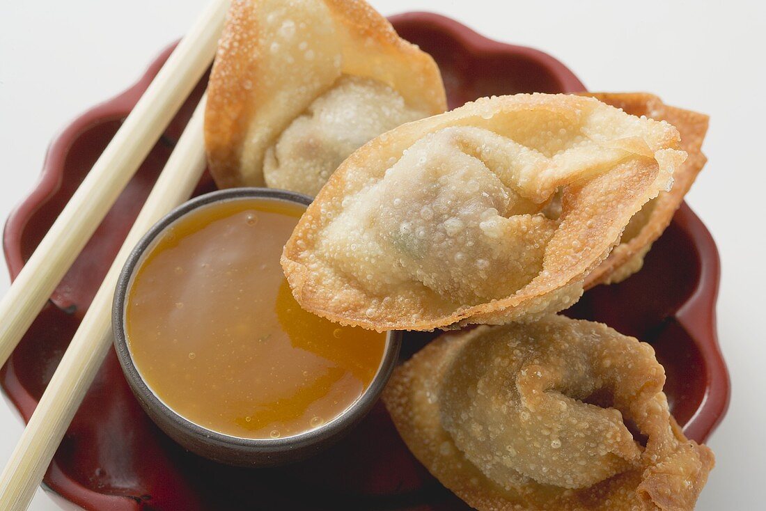 Deep-fried dim sum with sweet & sour sauce (Asia)