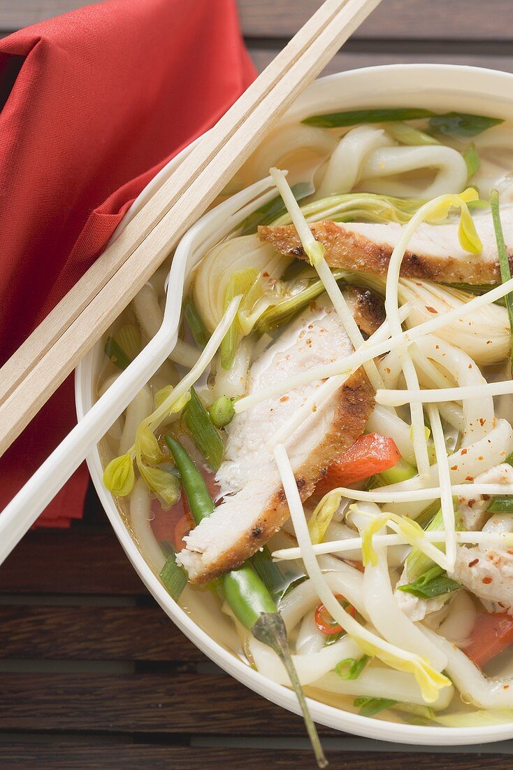 Spicy noodle soup with chicken and vegetables (Asia)