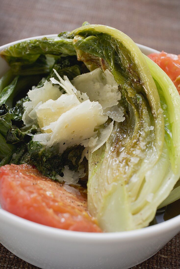 Braised romaine lettuce with tomatoes and Parmesan