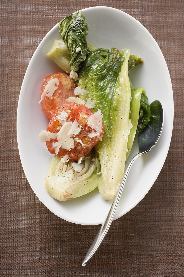 Braised romaine lettuce with tomatoes and Parmesan