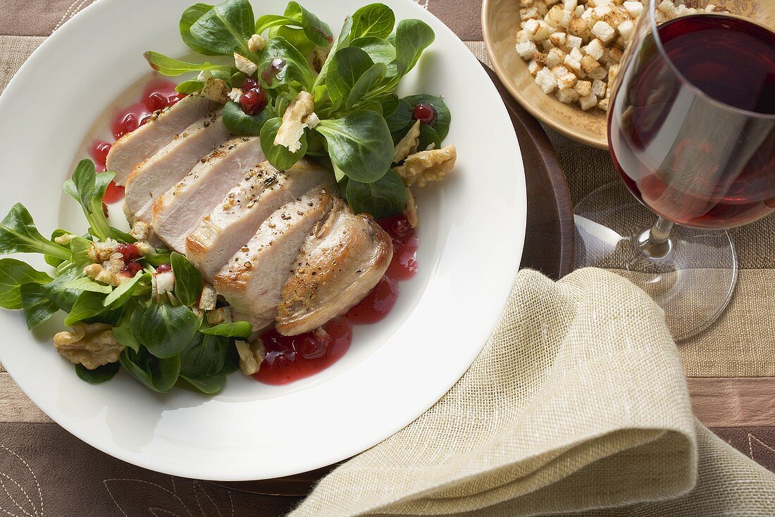 Pheasant breast with cranberry sauce and corn salad